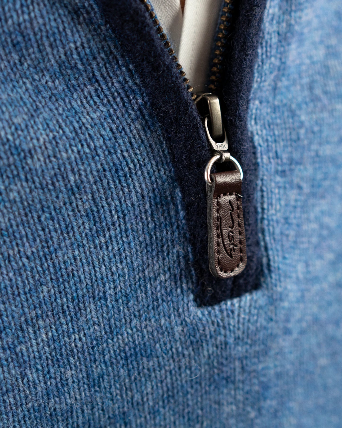 detail of zip with boiled wool trim for sweater in cashmere and merino