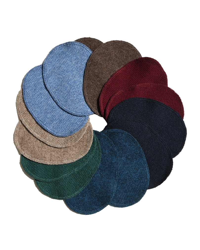 Set of different coloured knitted elbow patches in a circle