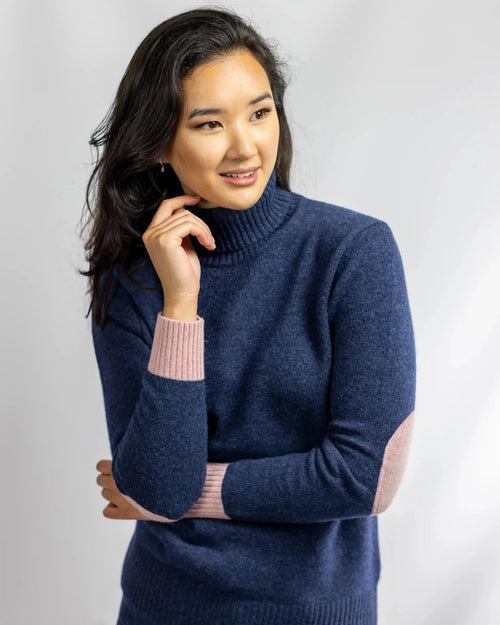 Womens roll neck jumper with pale pink elbow patches and cuff ends in cashmere and merino from Misty Cashmere