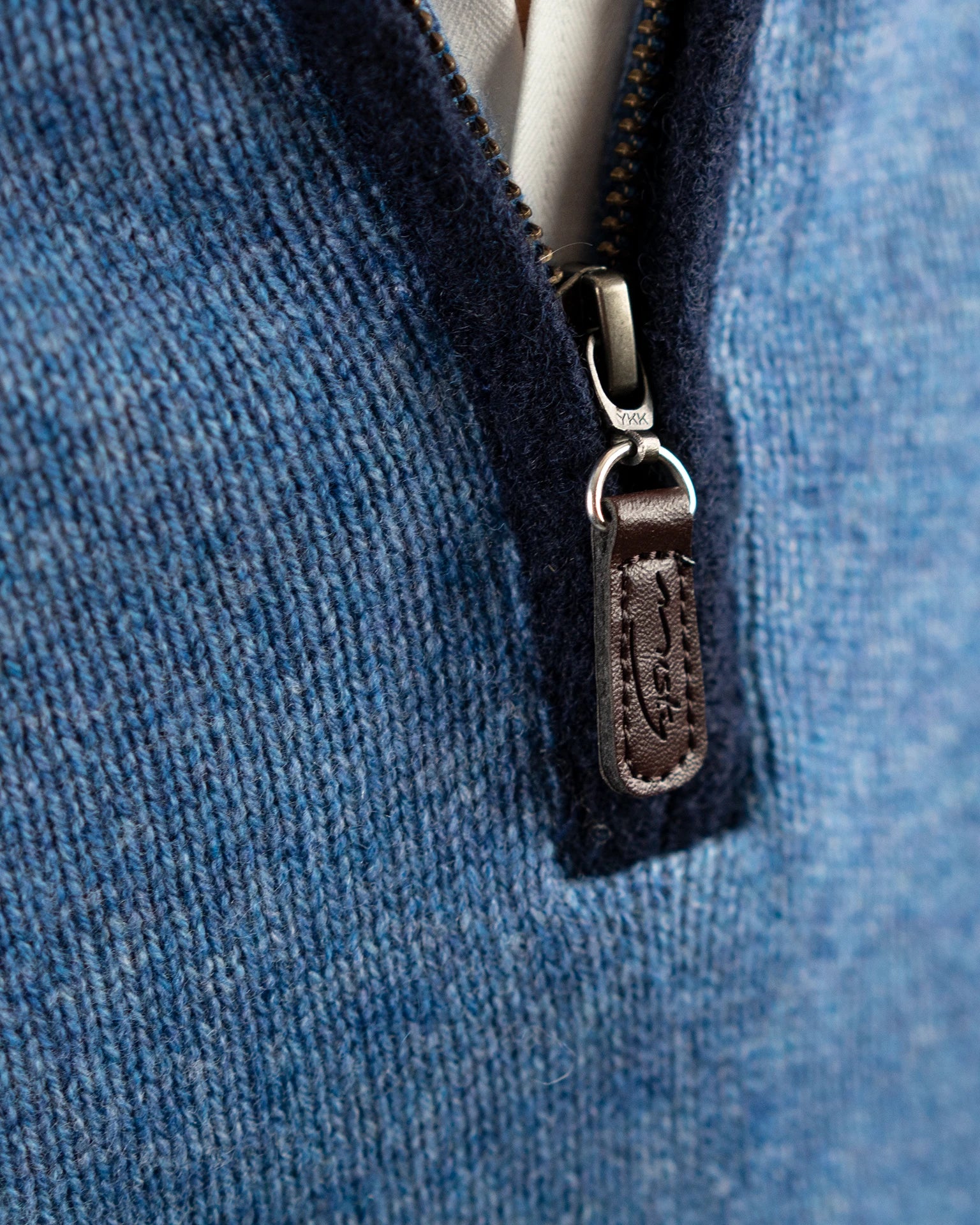 detail of zip with boiled wool trim for sweater in cashmere and merino
