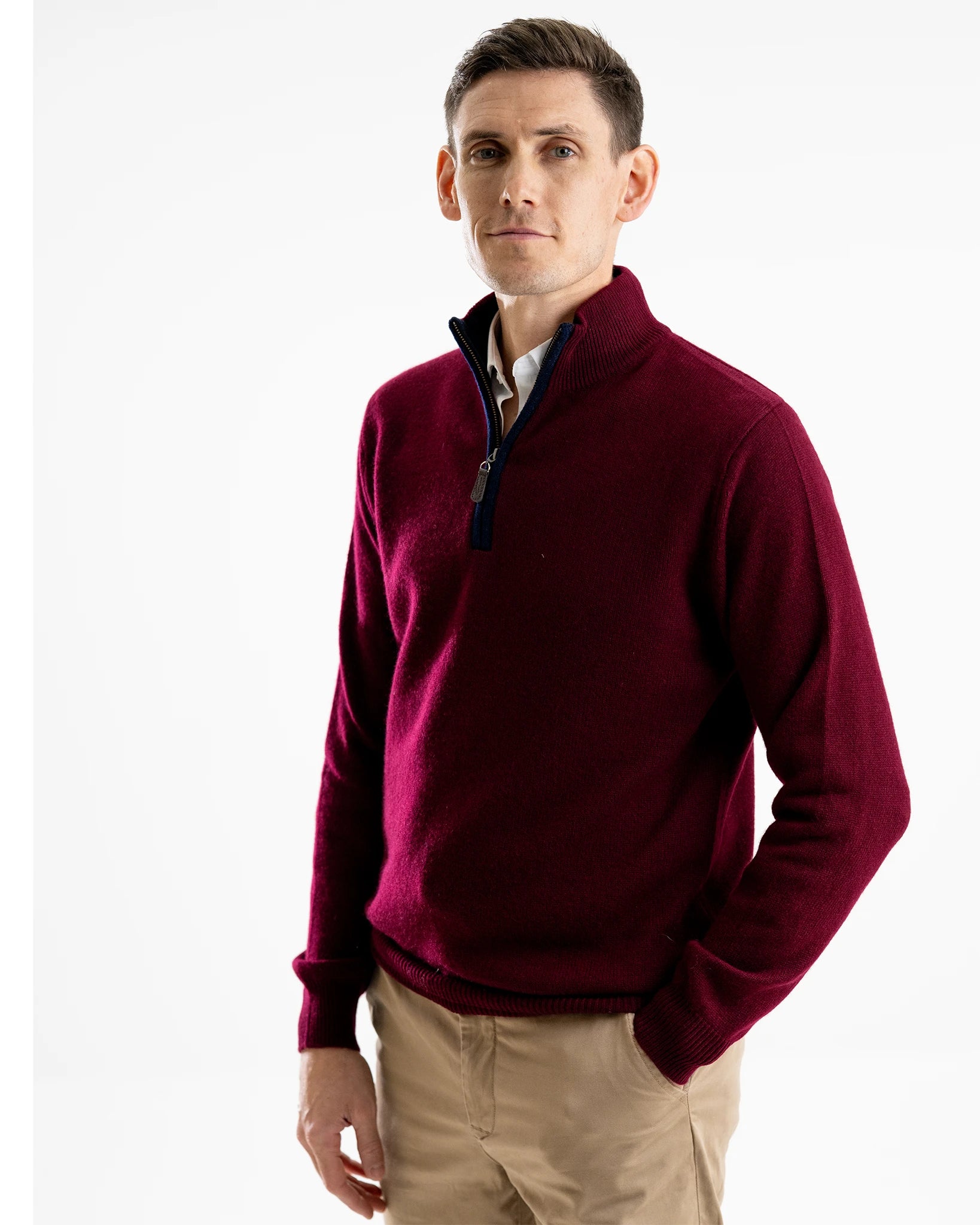 Men's zip neck jumper in cashmere and merino with navy boiled wool zip trim in studio