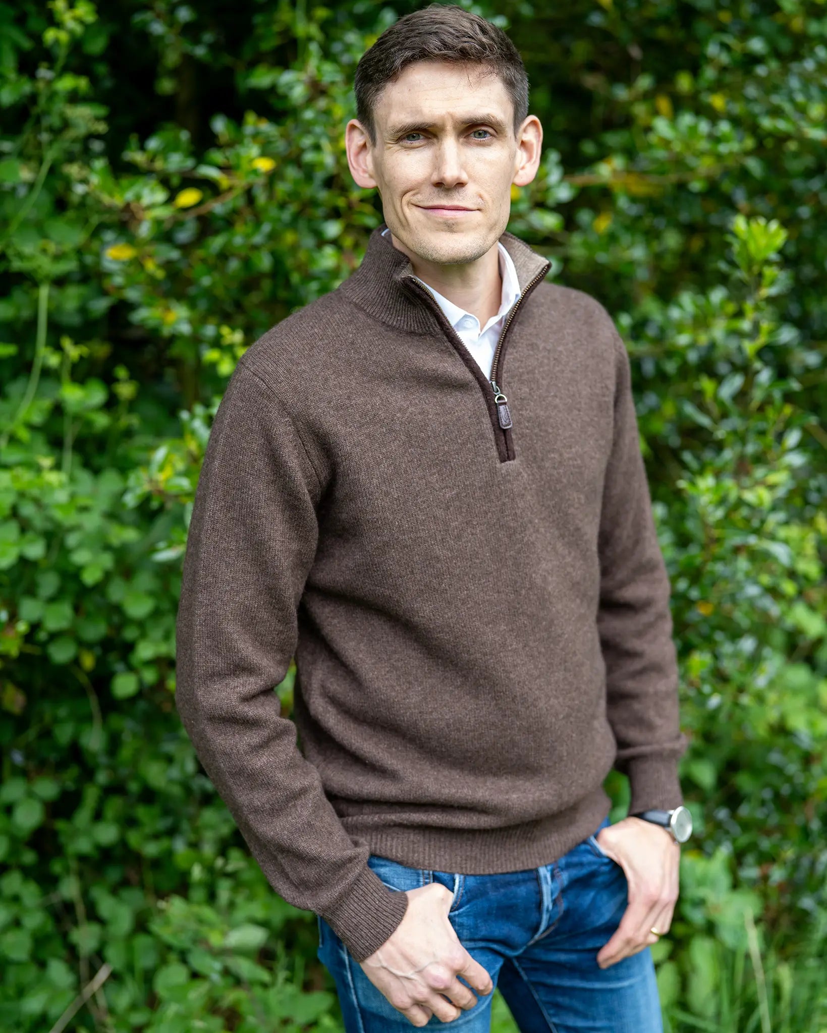 Model wearing yak yarn zip neck jumper in natural dark colour with brown boiled wool zip by Misty Cashmere